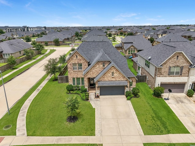 1926 Kingston Meadow Ln, Katy, TX 77494 - view of front of home with a residential view, concrete driveway, brick siding, and stone siding