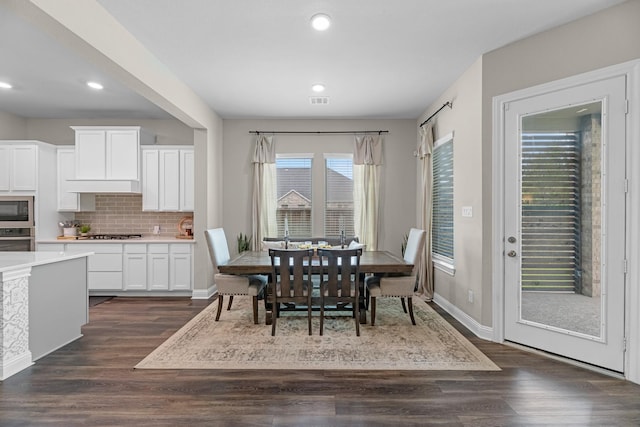 1926 Kingston Meadow Ln, Katy, TX 77494 - dining space with dark wood-style floors and recessed lighting