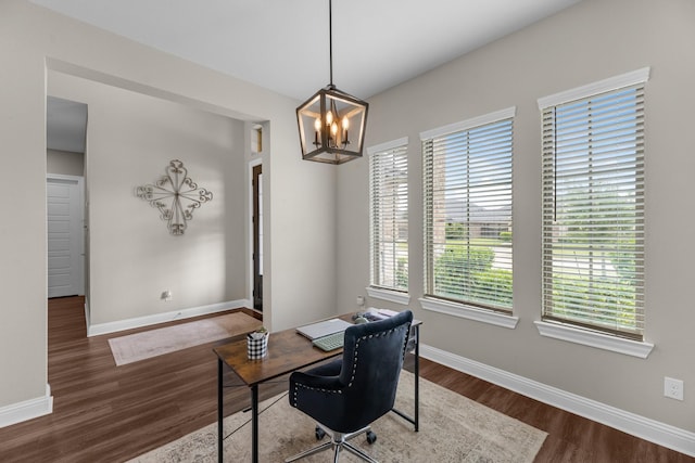 1926 Kingston Meadow Ln, Katy, TX 77494 - home office featuring dark wood-type flooring and a chandelier