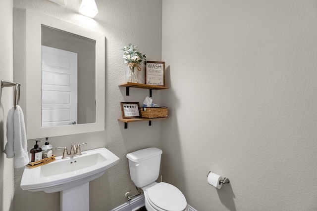 1926 Kingston Meadow Ln, Katy, TX 77494 - bathroom featuring toilet and a sink