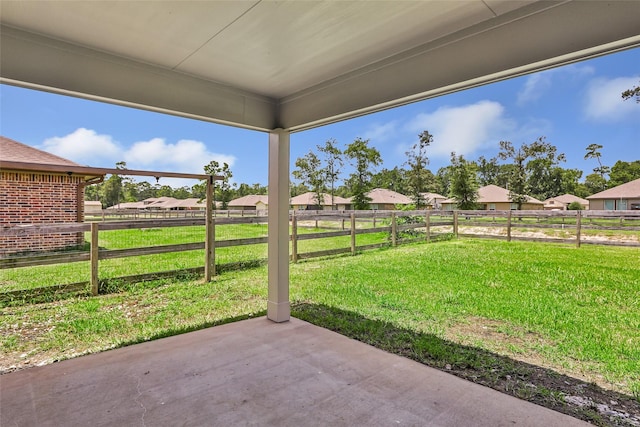 214 Kickapoo Dr, Anahuac, TX 77514 - view of patio with a residential view