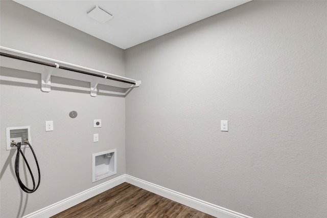 214 Kickapoo Dr, Anahuac, TX 77514 - laundry area with electric dryer hookup, washer hookup, dark wood-style flooring, and hookup for a gas dryer