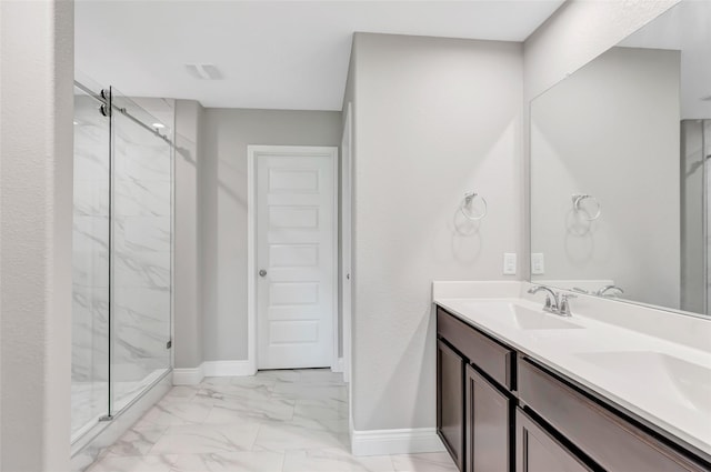 214 Kickapoo Dr, Anahuac, TX 77514 - full bath with marble look tile flooring, a marble finish shower, and double vanity