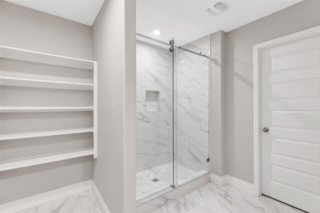 214 Kickapoo Dr, Anahuac, TX 77514 - bathroom with marble finish floors, a marble finish shower, and recessed lighting