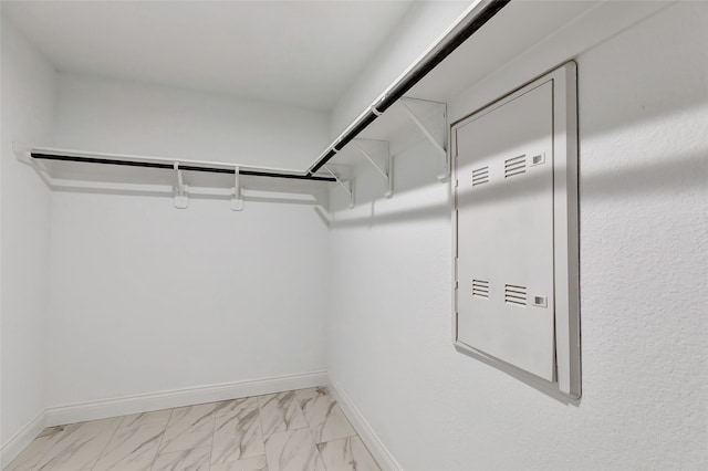 214 Kickapoo Dr, Anahuac, TX 77514 - spacious closet with light marble finish floors