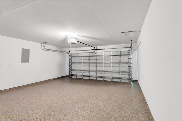 214 Kickapoo Dr, Anahuac, TX 77514 - garage featuring electric panel and a garage door opener