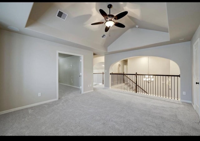 5011 Anthony Springs Ln, Sugar Land, TX 77479 - carpeted spare room with a ceiling fan, a chandelier, vaulted ceiling, and arched walkways