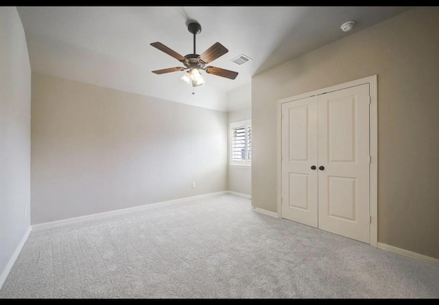 5011 Anthony Springs Ln, Sugar Land, TX 77479 - unfurnished bedroom featuring carpet, a closet, and a ceiling fan