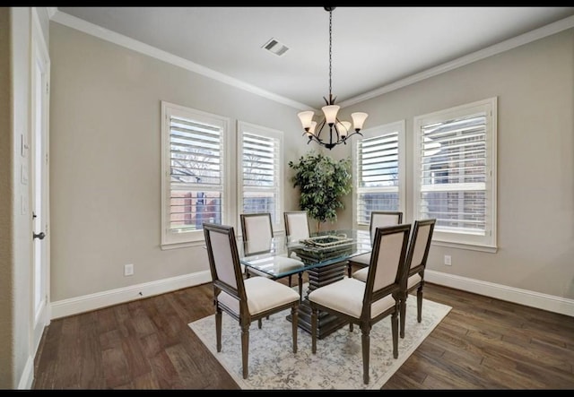 5011 Anthony Springs Ln, Sugar Land, TX 77479 - dining room featuring a chandelier, dark wood-type flooring, and crown molding