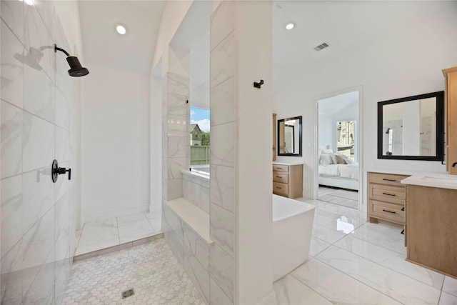 11822 Creekside Shore Cir, Cypress, TX 77433 - ensuite bathroom with a marble finish shower, vanity, a freestanding bath, marble finish flooring, and recessed lighting