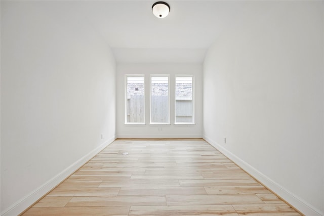11822 Creekside Shore Cir, Cypress, TX 77433 - empty room with wood finished floors and lofted ceiling
