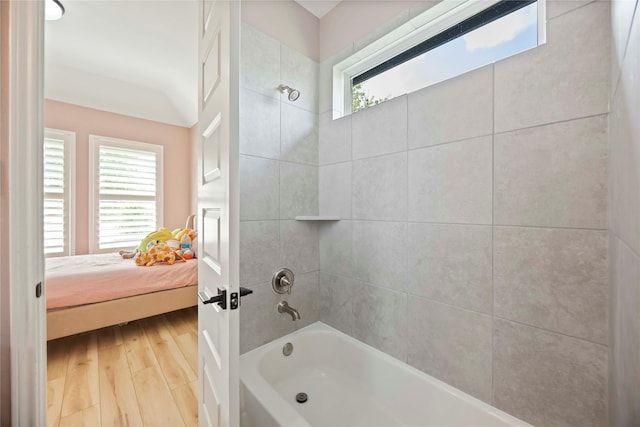 11822 Creekside Shore Cir, Cypress, TX 77433 - ensuite bathroom featuring  shower combination and wood finished floors