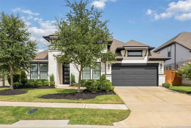 11822 Creekside Shore Cir, Cypress, TX 77433 - view of front of house with brick siding, concrete driveway, a shingled roof, and a garage