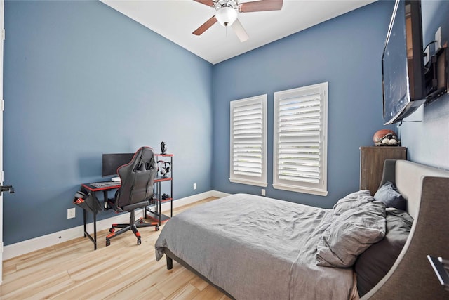 11822 Creekside Shore Cir, Cypress, TX 77433 - bedroom with wood finished floors, an office area, and ceiling fan
