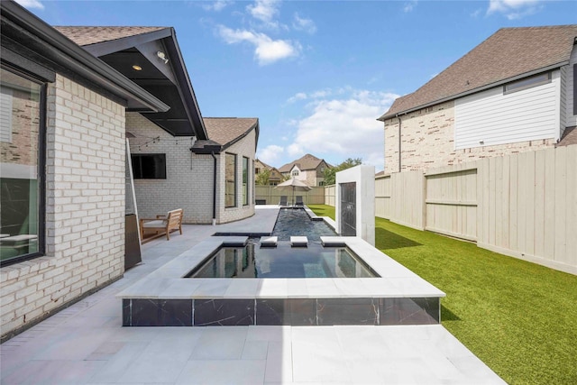 11822 Creekside Shore Cir, Cypress, TX 77433 - fenced backyard with a patio area
