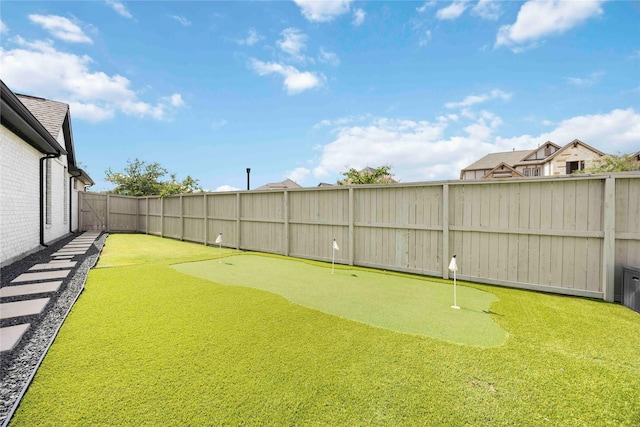 11822 Creekside Shore Cir, Cypress, TX 77433 - fenced backyard featuring an area to practice putting