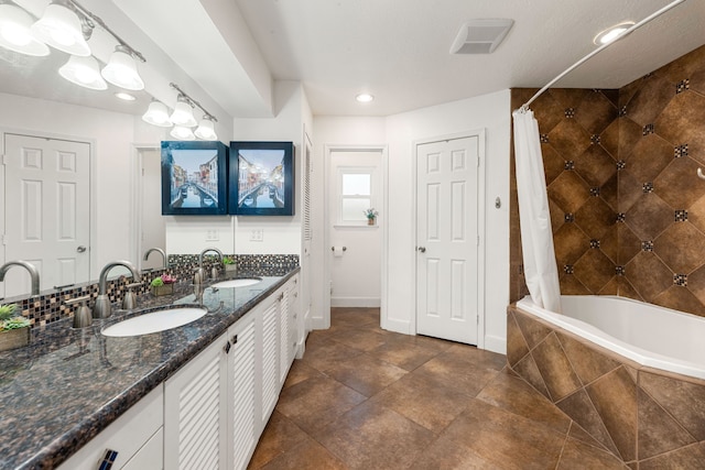 7306 Creek Crest Dr, Houston, TX 77095 - full bathroom with tiled shower / bath, double vanity, and recessed lighting