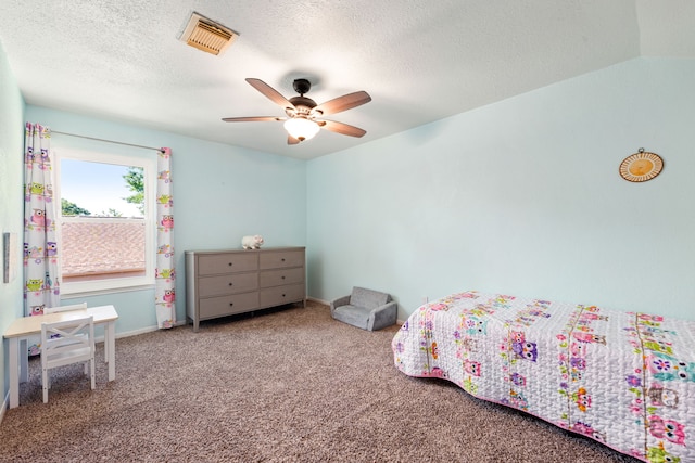 7306 Creek Crest Dr, Houston, TX 77095 - carpeted bedroom with a textured ceiling and a ceiling fan