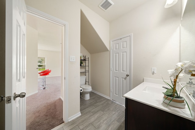 14722 Ruddy Duck Ln, Houston, TX 77049 - bathroom with vanity and wood finished floors
