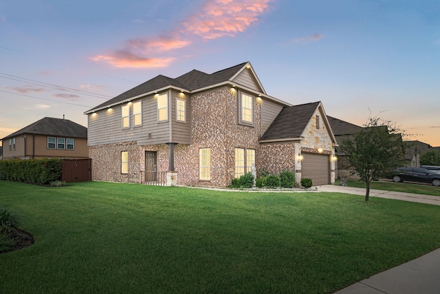 14722 Ruddy Duck Ln, Houston, TX 77049 - view of front of house featuring brick siding, a lawn, concrete driveway, and a shingled roof