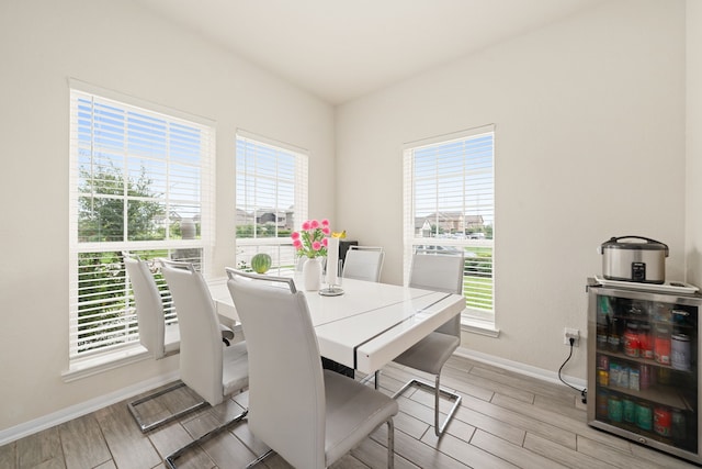 14722 Ruddy Duck Ln, Houston, TX 77049 - dining area with healthy amount of natural light and light wood-style flooring