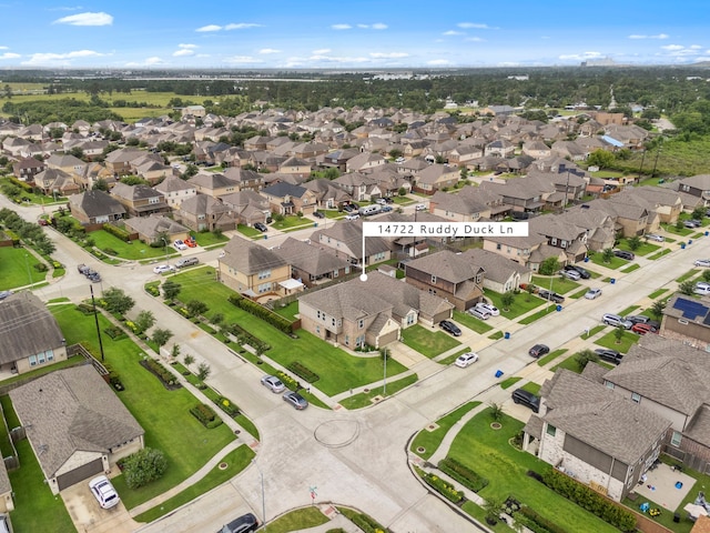 14722 Ruddy Duck Ln, Houston, TX 77049 - aerial overview of property's location with nearby suburban area