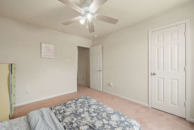 14722 Ruddy Duck Ln, Houston, TX 77049 - bedroom featuring light carpet and a ceiling fan