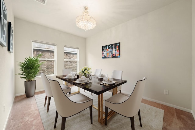 14722 Ruddy Duck Ln, Houston, TX 77049 - dining area with a chandelier and light colored carpet