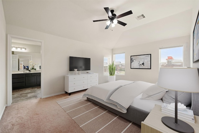 14722 Ruddy Duck Ln, Houston, TX 77049 - bedroom featuring light carpet, lofted ceiling, ensuite bathroom, and ceiling fan