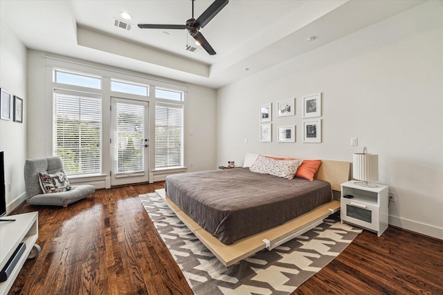 1422 Rosedale St, Houston, TX 77004 - bedroom with access to outside, wood finished floors, a raised ceiling, and a ceiling fan