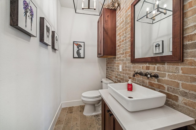 1422 Rosedale St, Houston, TX 77004 - half bathroom featuring a chandelier and vanity