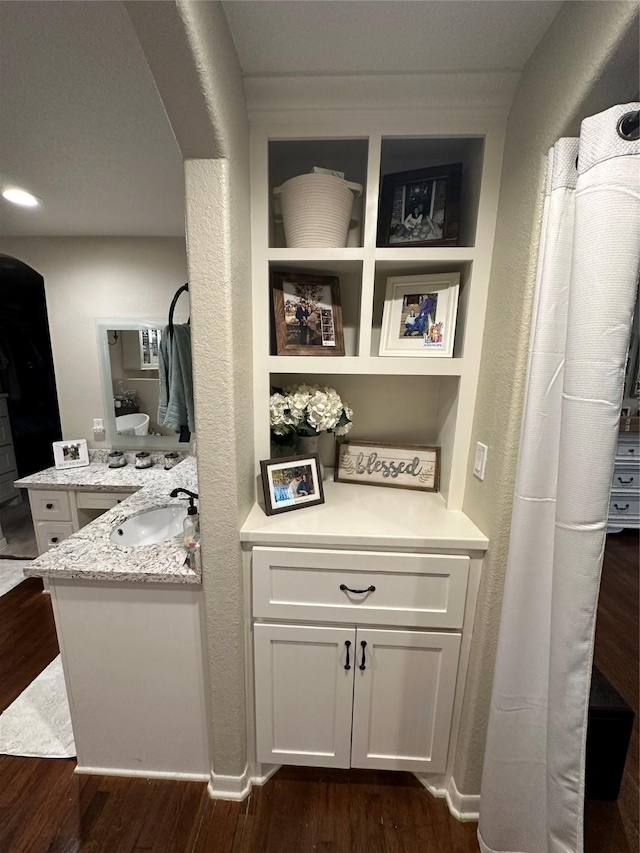 2201 Oleander Dr, Dickinson, TX 77539 - detailed view of wood finished floors and vanity