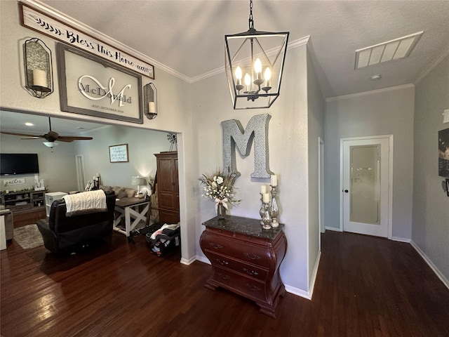 2201 Oleander Dr, Dickinson, TX 77539 - hall featuring wood finished floors, crown molding, and a chandelier