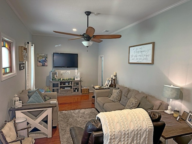 2201 Oleander Dr, Dickinson, TX 77539 - living area with wood finished floors, ceiling fan, and ornamental molding