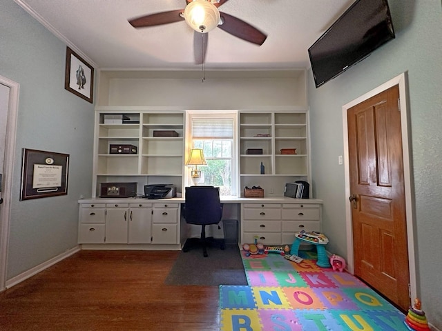 2201 Oleander Dr, Dickinson, TX 77539 - office with ceiling fan, dark wood finished floors, and built in study area