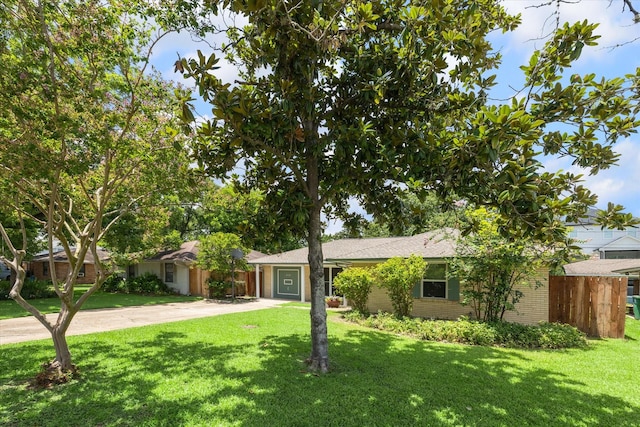 2110 Chippendale Rd, Houston, TX 77018 - single story home with concrete driveway and brick siding