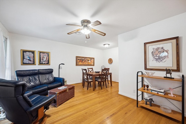 2110 Chippendale Rd, Houston, TX 77018 - living room featuring ceiling fan and light wood finished floors