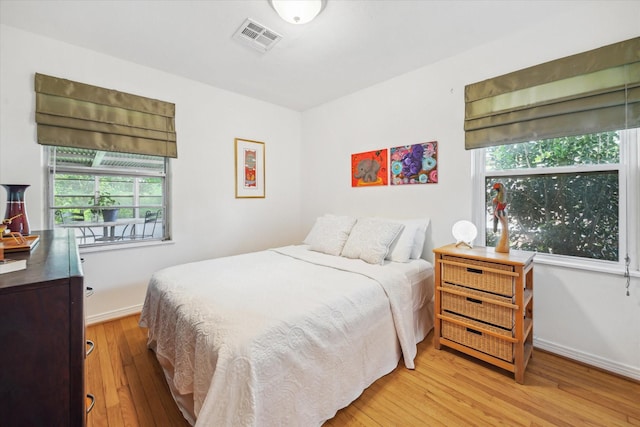 2110 Chippendale Rd, Houston, TX 77018 - bedroom with light wood-style floors and baseboards