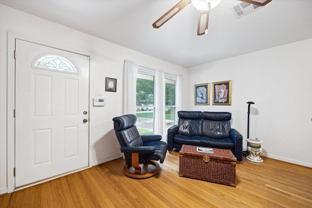 2110 Chippendale Rd, Houston, TX 77018 - living area with wood finished floors and ceiling fan