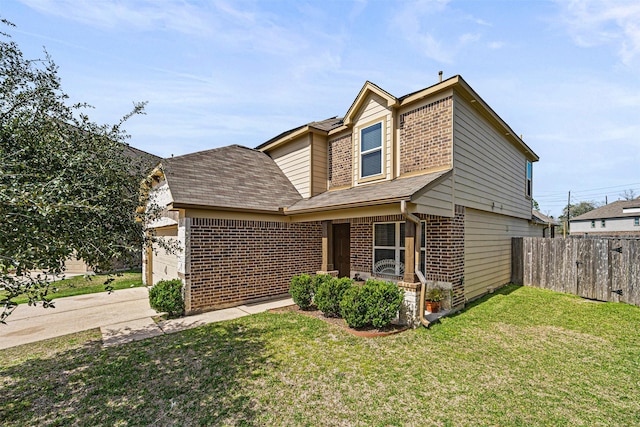15307 Meandering Post Trl, Houston, TX 77044 - traditional home with brick siding, an attached garage, roof with shingles, and concrete driveway