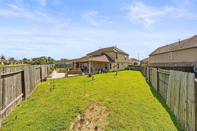 15307 Meandering Post Trl, Houston, TX 77044 - fenced backyard featuring a patio area