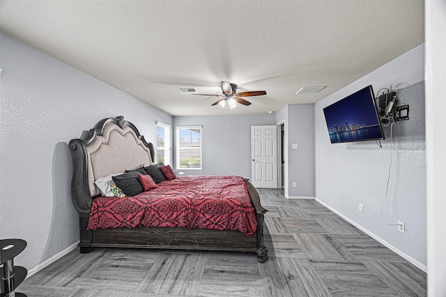 15307 Meandering Post Trl, Houston, TX 77044 - bedroom with a textured ceiling and ceiling fan
