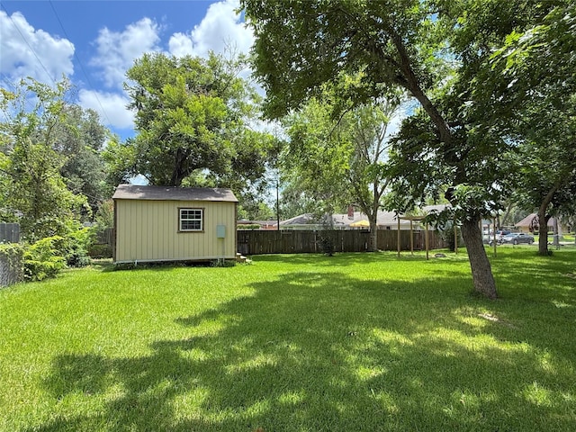 132 Daisy St, Lake Jackson, TX 77566 - view of yard with a storage unit