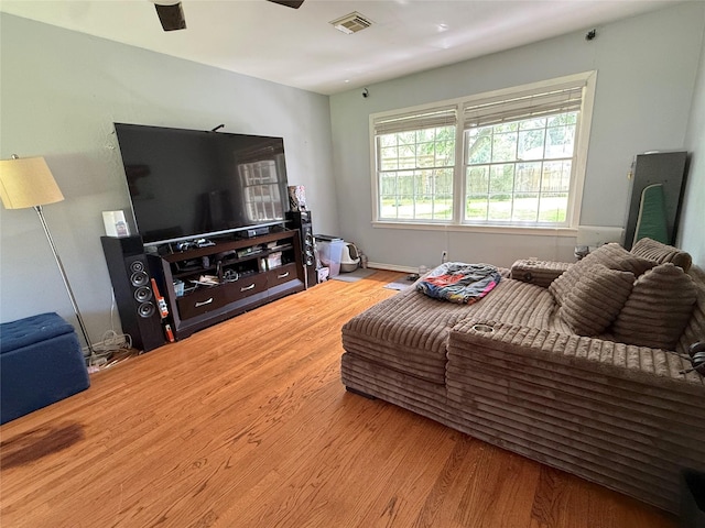 132 Daisy St, Lake Jackson, TX 77566 - living room with wood finished floors and ceiling fan