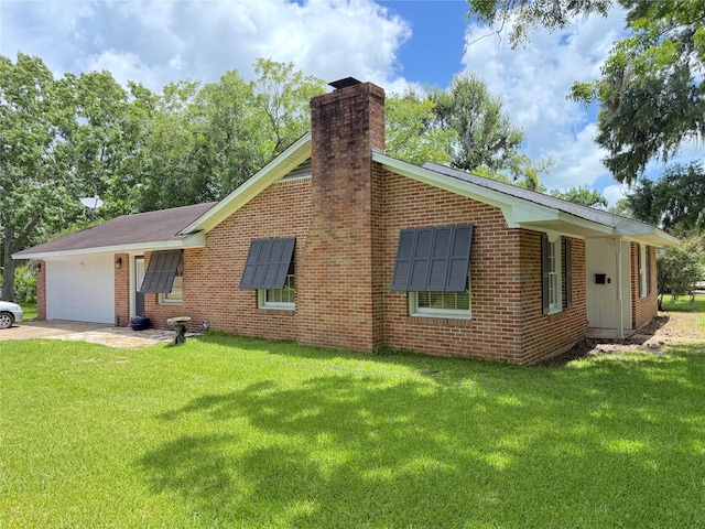 132 Daisy St, Lake Jackson, TX 77566 - view of front facade with a chimney, a garage, a front lawn, concrete driveway, and brick siding