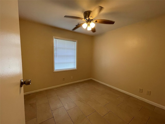 300 Robbie St, La Marque, TX 77568 - empty room featuring a ceiling fan and light tile patterned floors