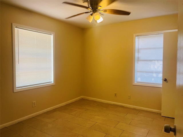 300 Robbie St, La Marque, TX 77568 - empty room featuring a ceiling fan and light tile patterned floors
