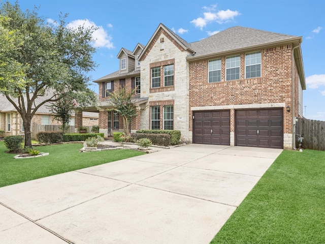3310 Compass Ct, Conroe, TX 77301 - view of front facade featuring an attached garage, concrete driveway, stone siding, brick siding, and a shingled roof