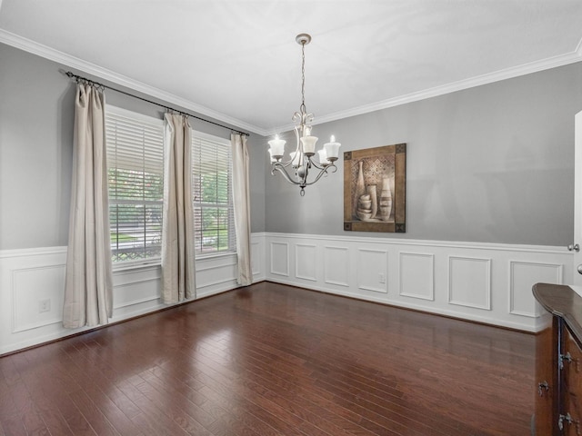 3310 Compass Ct, Conroe, TX 77301 - unfurnished dining area with a chandelier, a wainscoted wall, crown molding, and wood finished floors