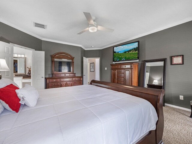 3310 Compass Ct, Conroe, TX 77301 - bedroom with carpet floors, ornamental molding, a ceiling fan, and connected bathroom